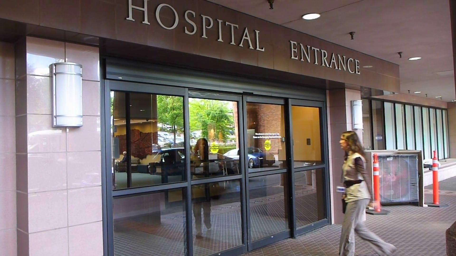 Woman Entering Hospital Building Stock Video Footage Storyblocks
