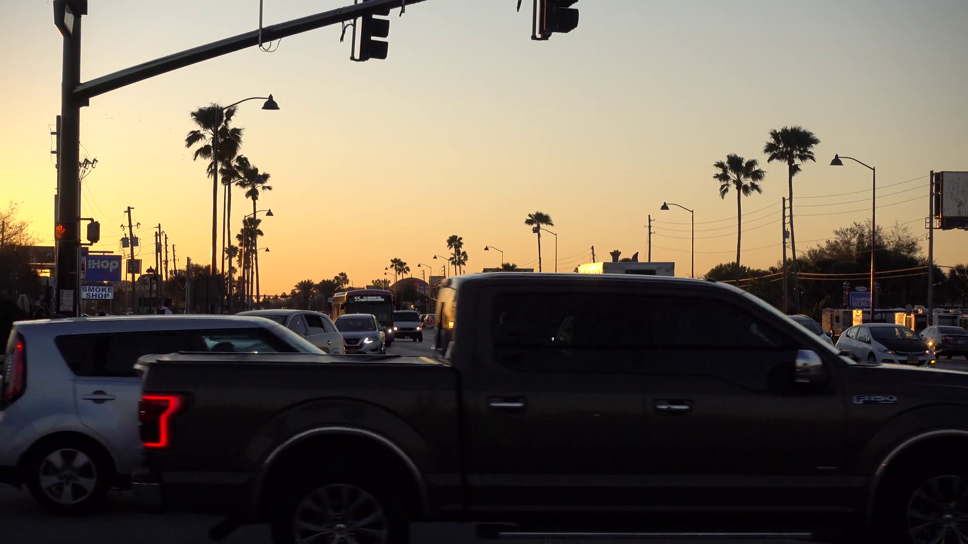 A Kissimmee City Bus Drives Down Road At Stock Footage SBV347752500
