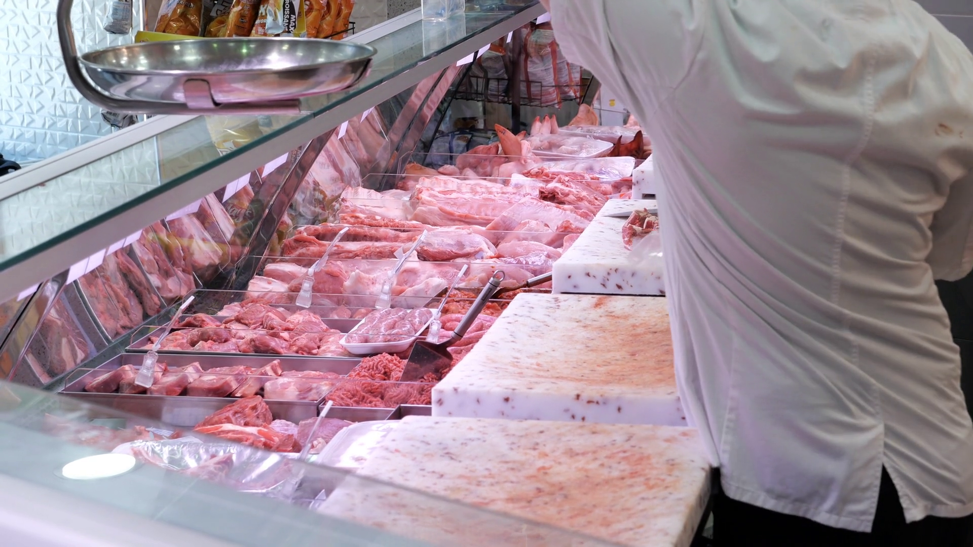 Butcher Cutting Up Meat Inside Butchery Shop Stock Footage SBV ...