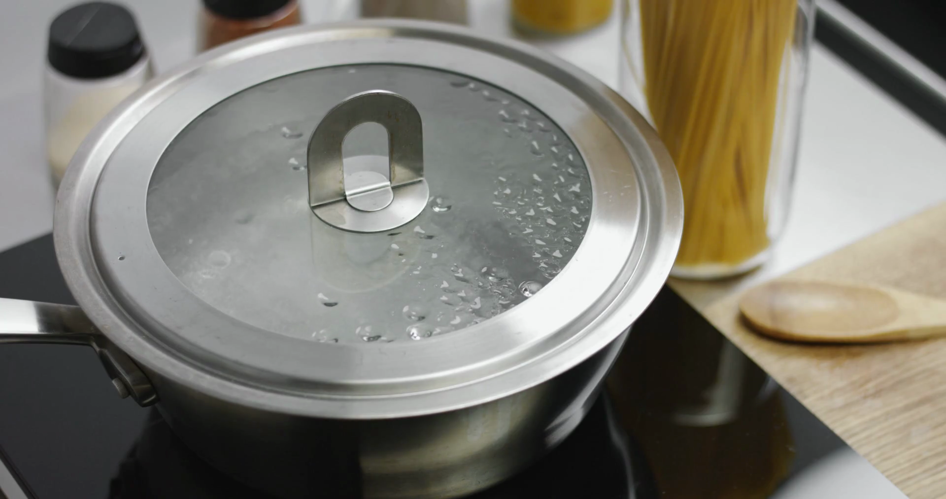 Rapidly Boiling Water In Stainless Steel Pot Stock Footage SBV