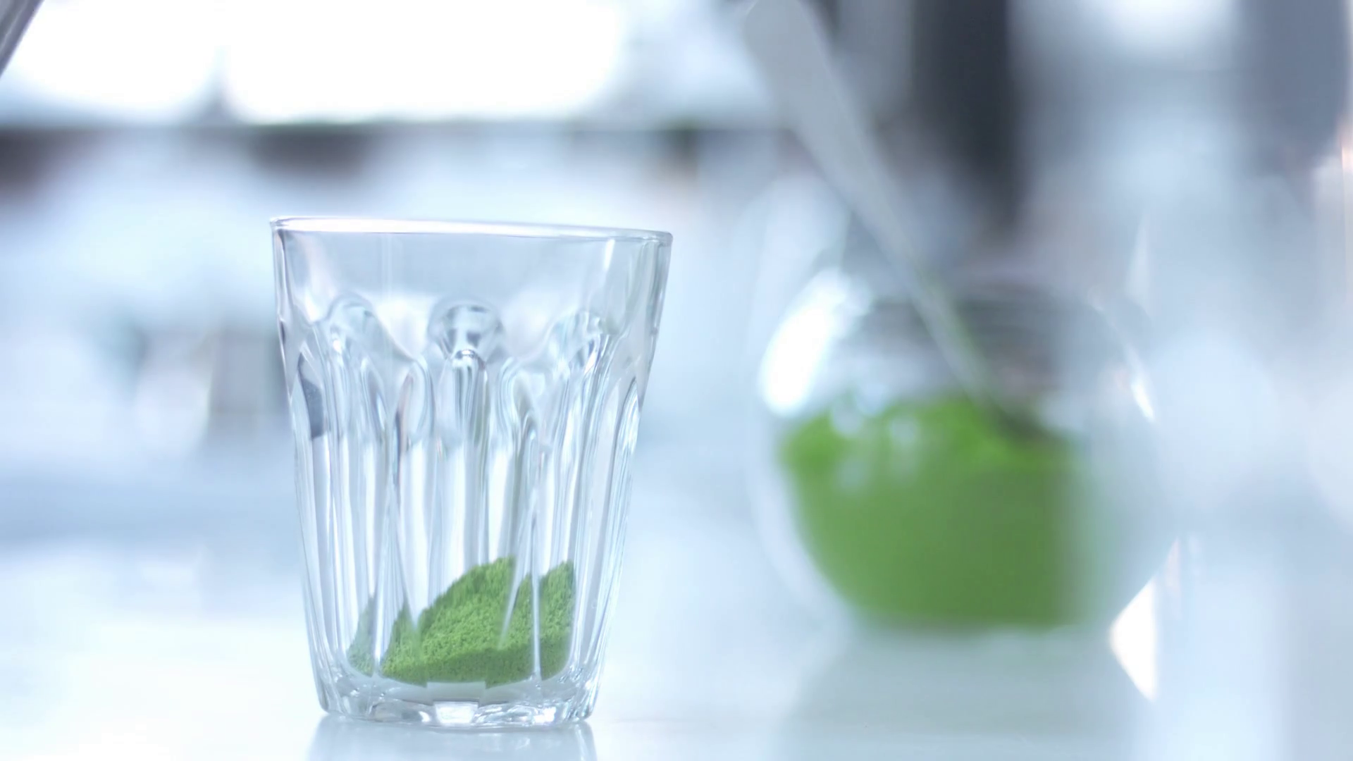 Water Pouring In Glass With Matcha Powder Stock Footage SBV-322289003 ...