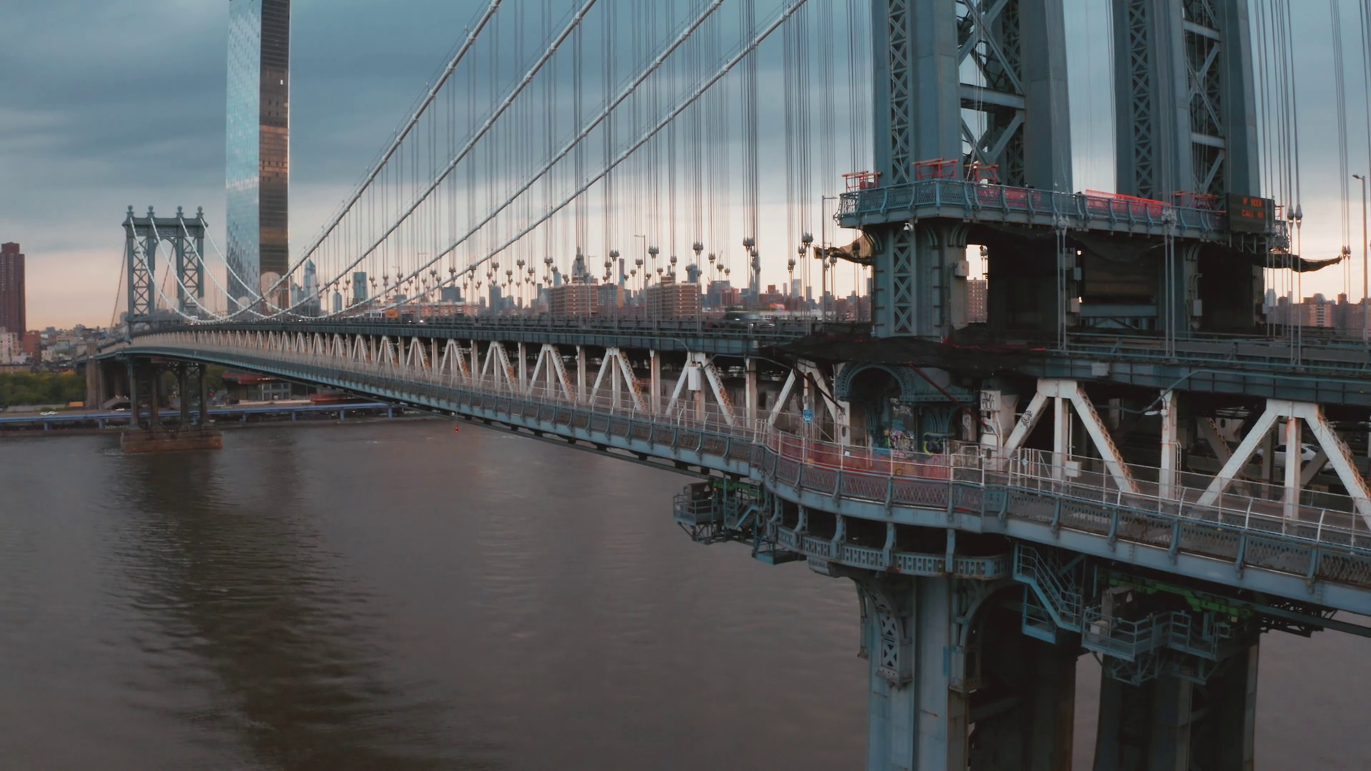 Aerial view of Manhattan Bridge structure and New York city at sunrise. Stock Video Footage 01