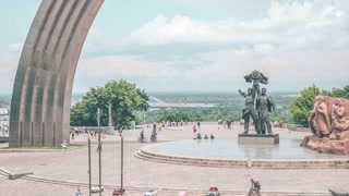 Time lapse view of the  People's Friendship Arch (opened on November 7, 1982) and the new pedestrian bridge (opened on May 25, 2019) connecting to Saint Volodymyr Hill.