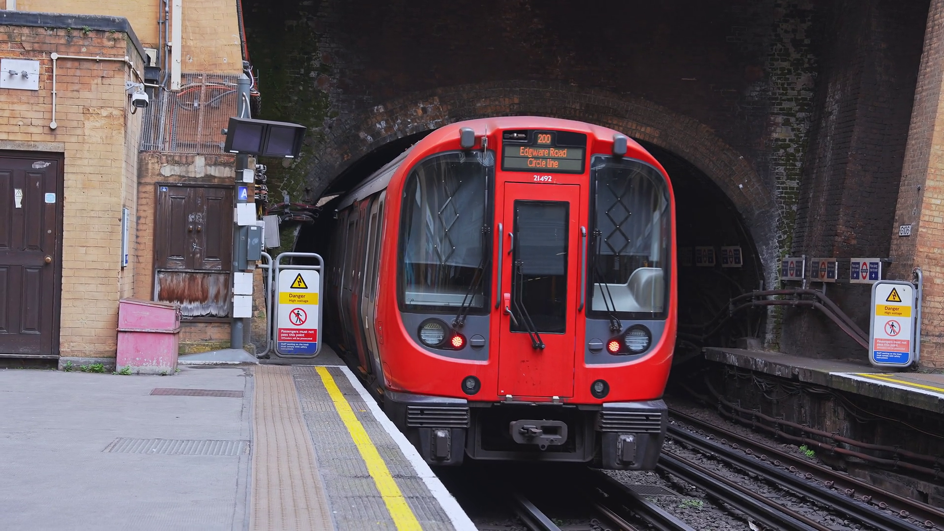 A Red London Underground Train Emerges From Stock Footage SBV-352022497 ...