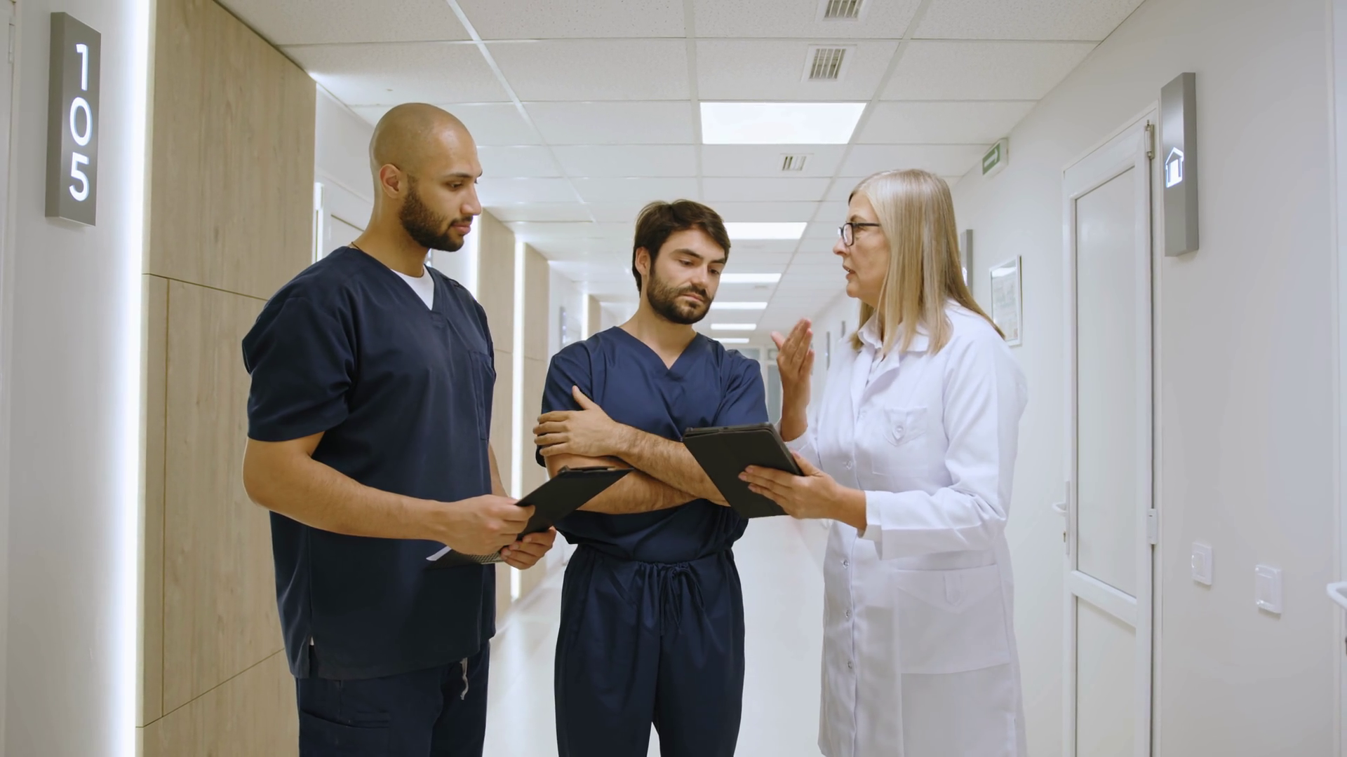 Medical Team Discussing Patient Records Stock Footage SBV-352720859 ...