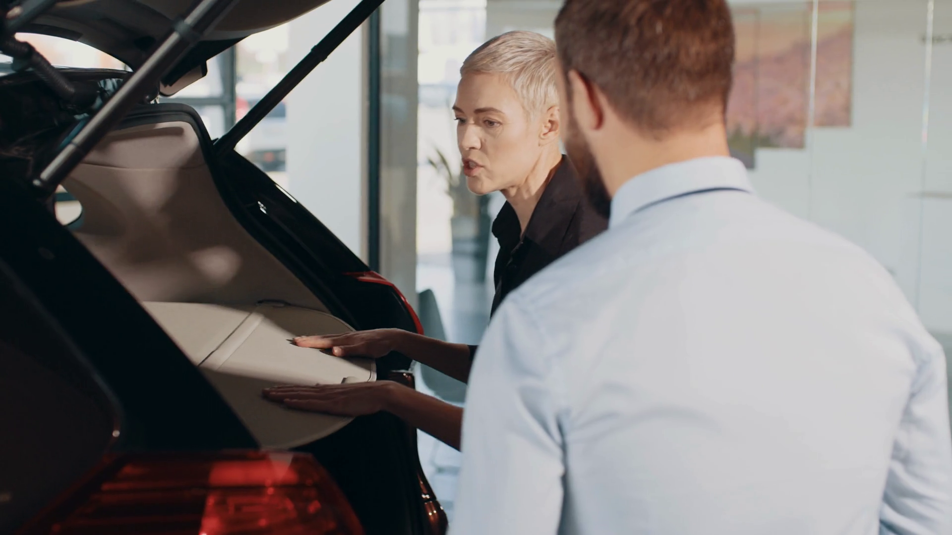 Woman Choose Car At Car Dealership Stock Footage SBV348456024