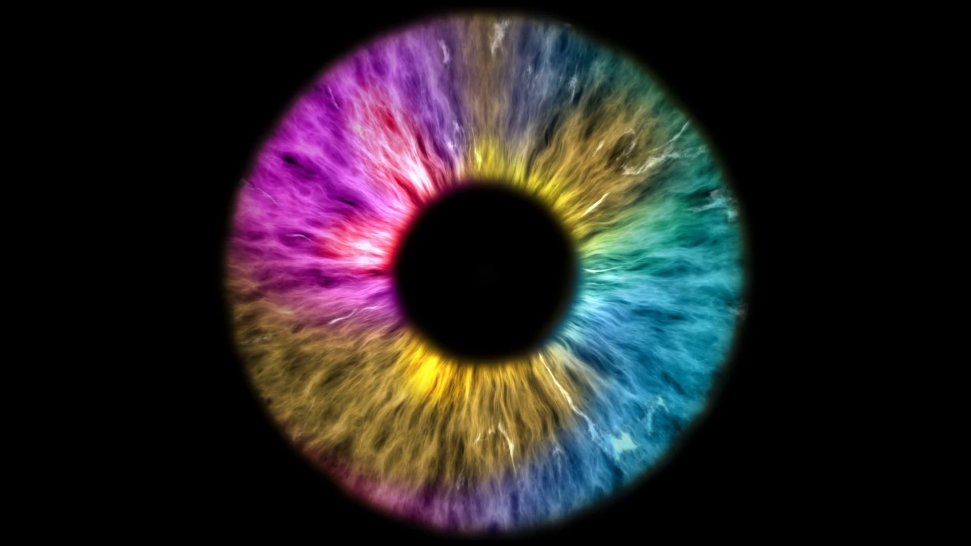 The colored eye is an extreme closeup of the iris and pupil, widening
