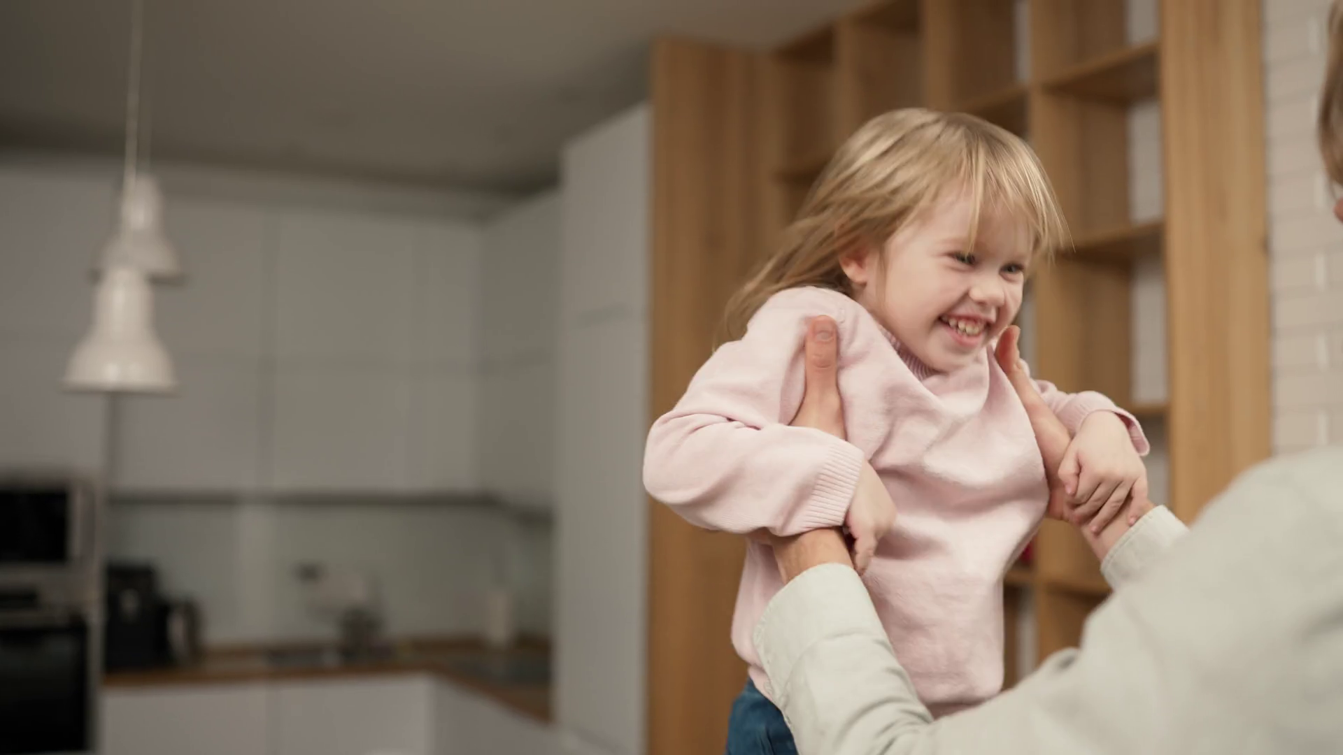 Young Father Throwing Up Baby Daughter At Stock Footage SBV347383899