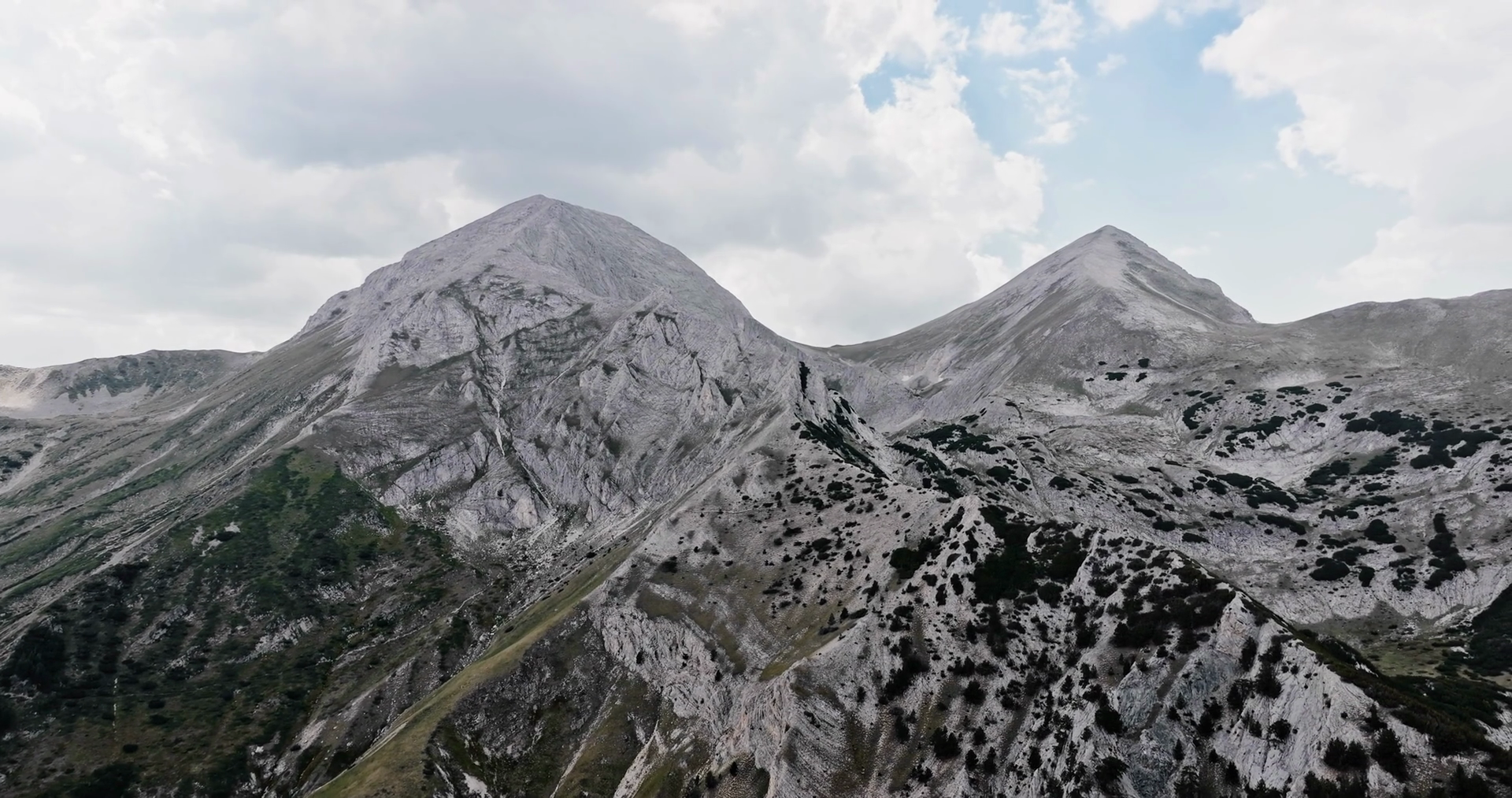 Aerial View Of Towering Mountain Range Stock Footage SBV-351894710 ...