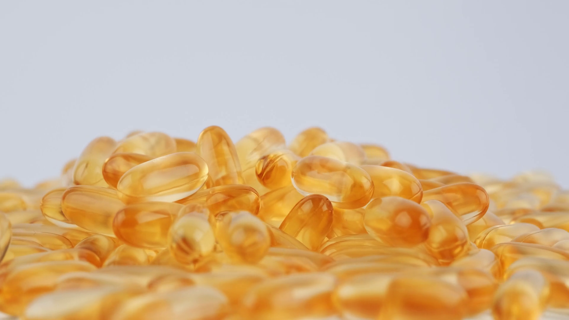 Omega 3 Bright Orange Gel Capsules Rotate On Stock Footage SBV