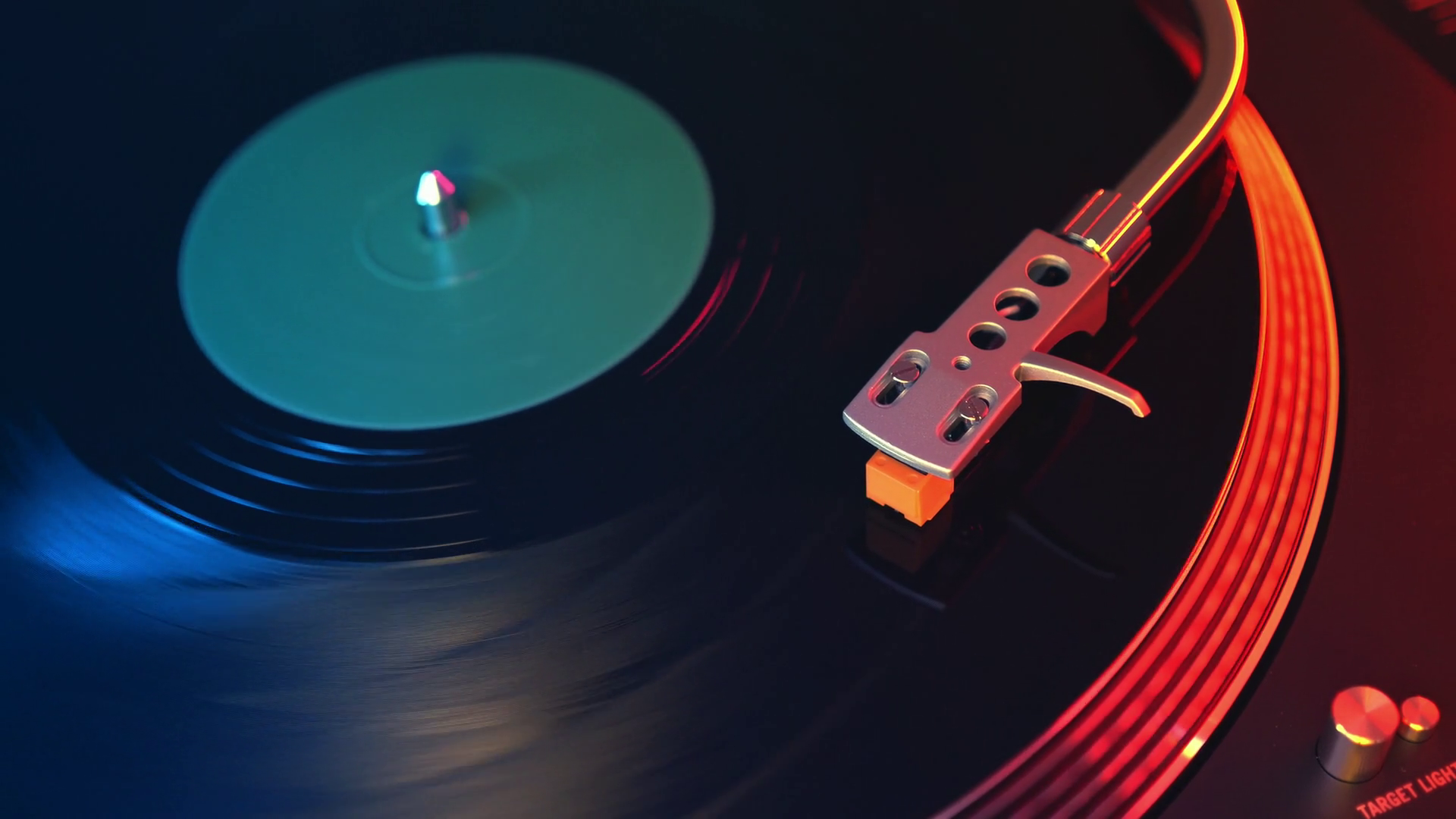Defocus in focus retro player vinyl records turntable closeup on