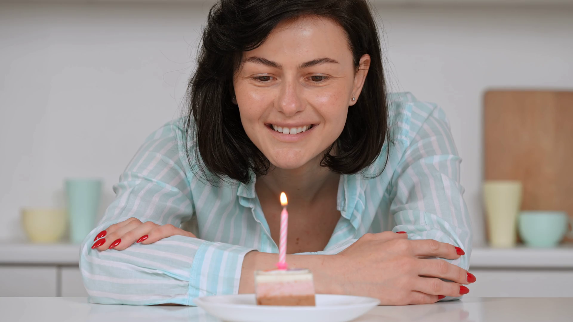 happy blowing candle celebrating date of birth Stock Video