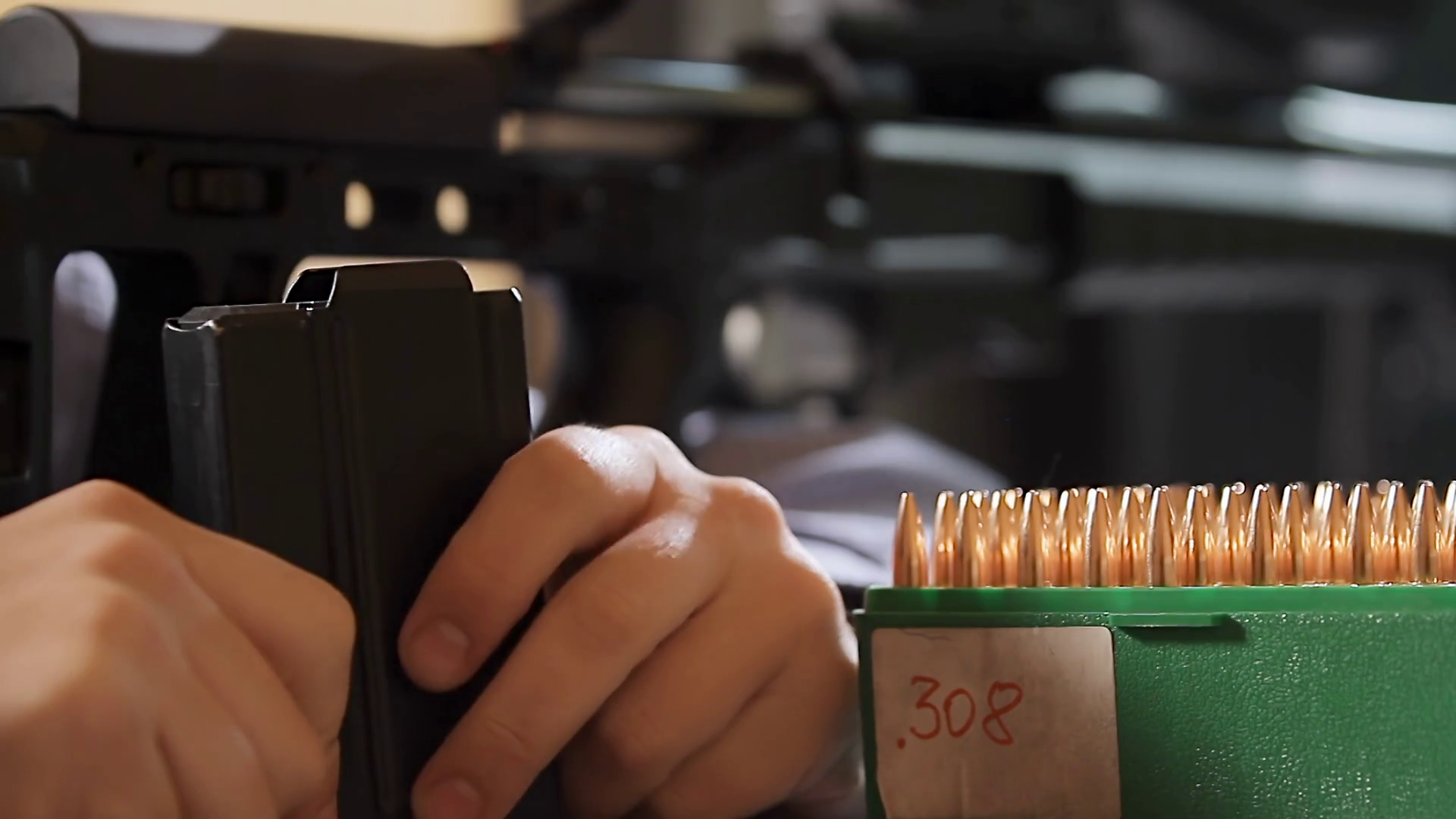 A man loading bullets Stock Video Footage 0021 SBV322643804 Storyblocks