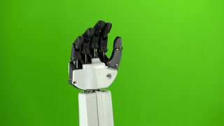 Robot Hand Close Up Waving Goodbye . Green Screen. Robot hand close up waving goodbye studio. Green screen