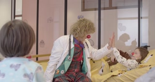 Clown Hospital Children Child . Saying goodbye with a wave, the clown in the hospital leaves behind happy hearts.