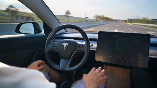 Tesla Self Driving Car Stock Footage: Royalty-Free Video Clips ...