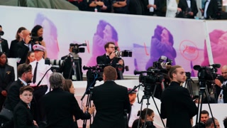 Cannes, France - May 13, 2025: Multiple photographers and videographers at the Cannes Film Festival