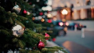 Close up of decorations on a Christmas tree in front of the Monte Carlo Casino in Monaco