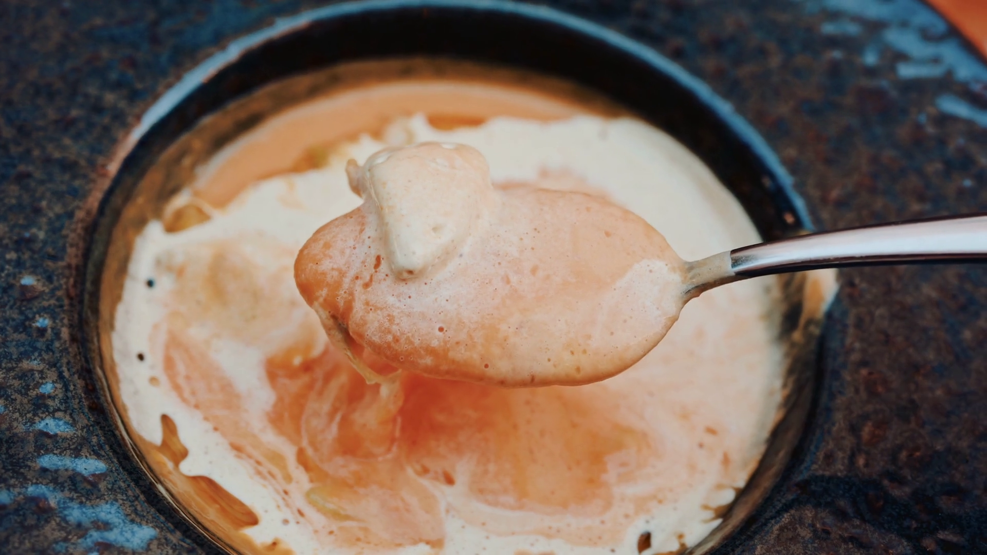 Close Up Of Spoon Lifting Creamy Soup With Stock Footage SBV-353440760 ...