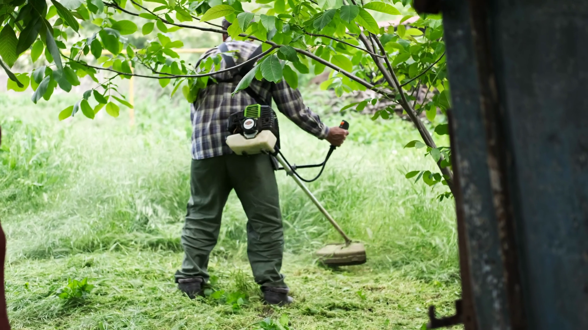 A Man Is Working With Hand-held Lawn Mower Stock Footage SBV-352492408 ...