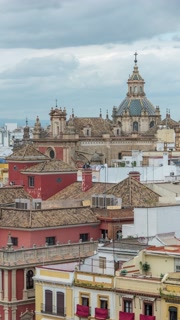 Seville Spain time lapse high angle view city skyline at city center (vertical)
