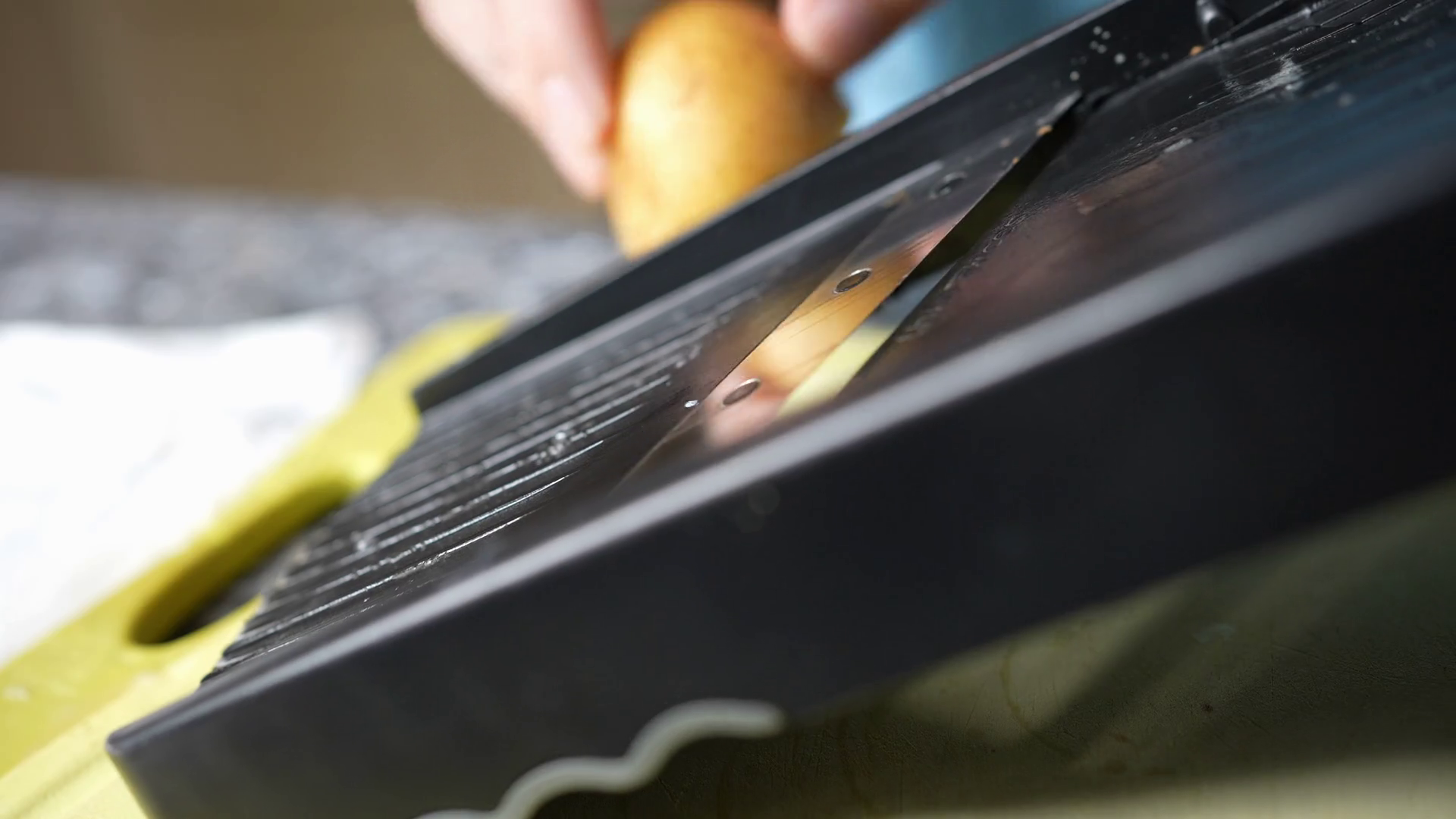 Amateur Chef Uses Mandoline Slicer To Slice Stock Footage SBV348510504