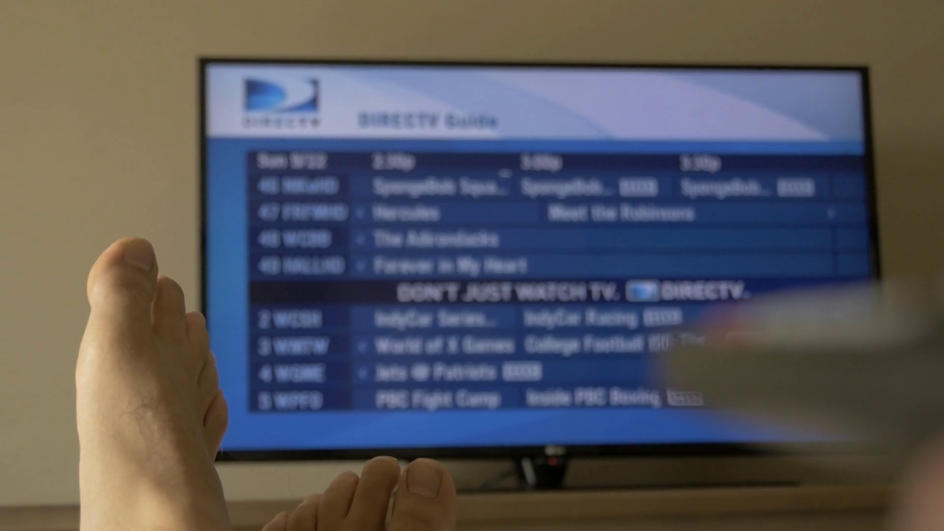 TV Channel Guide Searching For Show To Watch Stock Video Footage 00 51