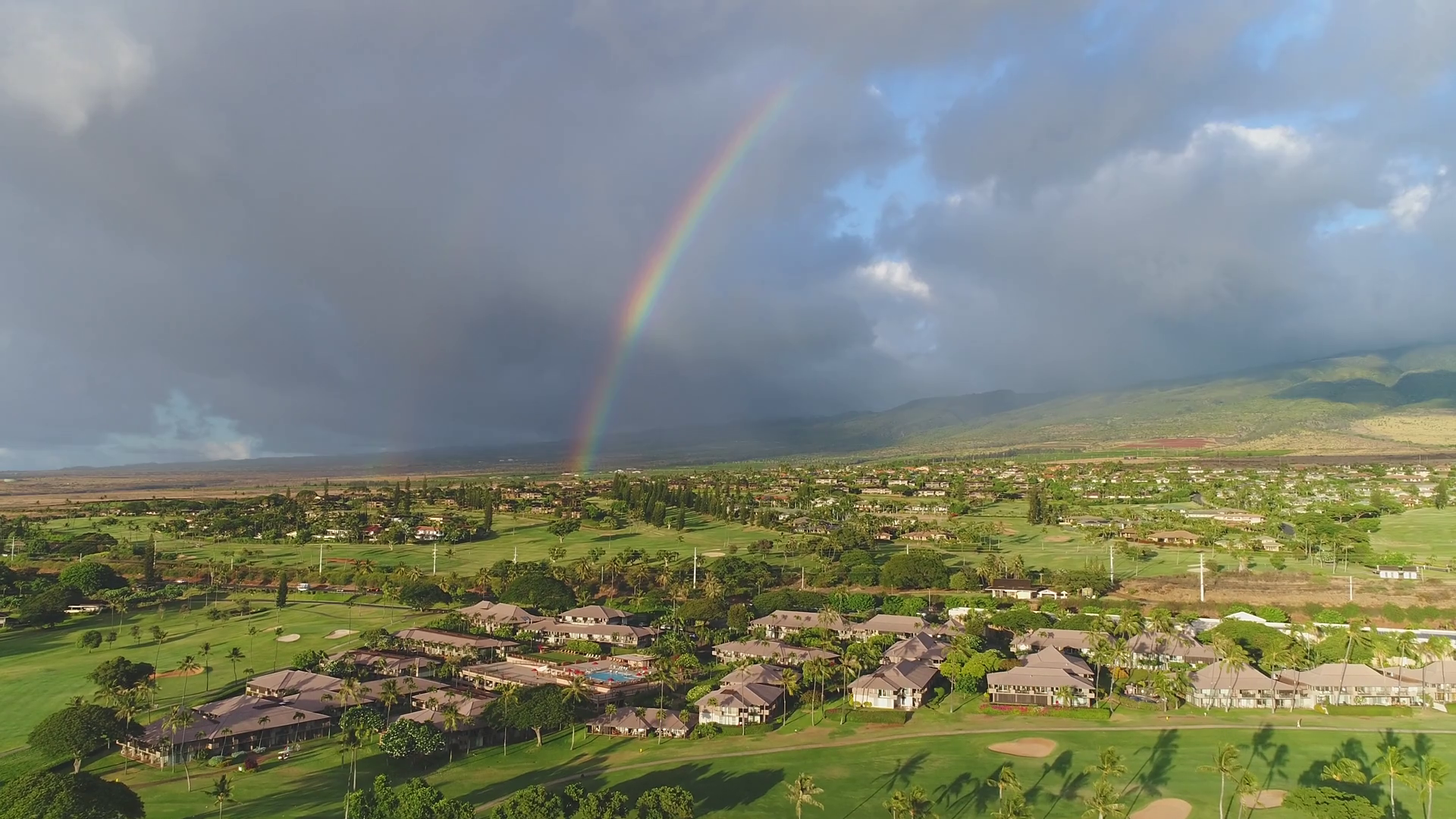 Aerial Of Rainbow Above Town In Maui Hawaii Stock Footage SBV323282677