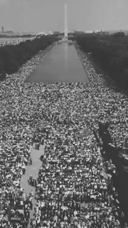 1963 - Crowds of activists applaud as Martin Luther King gives his I Have A Dream speech at the Lincoln Memorial during the March on Washington for Jobs and Freedom.