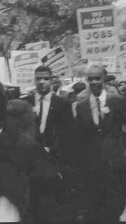 1963 - Civil rights activists are shown marching during the March on Washington for Jobs and Freedom.