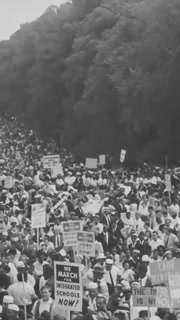 1963 - Marchers are shown as well as the Washington Monument and singer Marian Anderson takes the stage during the March on Washington for Jobs and Freedom.