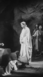 ISRAEL - 1927, in this silent epic film, after Lazarus is brought back to life, his family members hug him with joy while Jesus looks on with love and compassion. People joyfully praise the miracle.