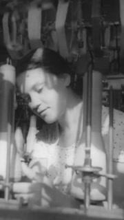 1938 - Jewish refugees work in a textile factory in Palestine.