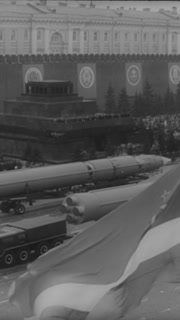 1966 - Intercontinental and anti-aircraft missiles are driven through Red Square in Moscow, Russia as part of a military parade celebrating May Day.