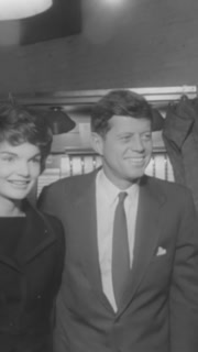 1960 - JFK is seen with his wife and daughter, and his campaign reaches absentee voters in Berlin, Germany.