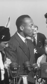 1936 - Jack Dempsey and Bill Robinson welcome home Olympic star Jesse Owens (narrated in 1961).