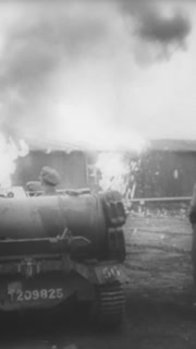 1945 - British troops treat and evacuate survivors of the Belsen concentration camp, capture its commander Josef Kramer, and burn down the camp.