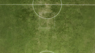 Aerial view of a green soccer field in Brazil.