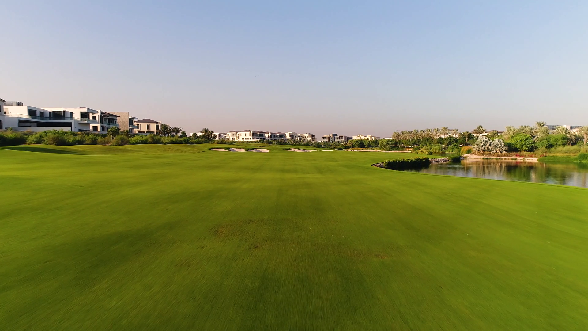 Aerial view of luxury golf club on residential area, Dubai, U.A.E