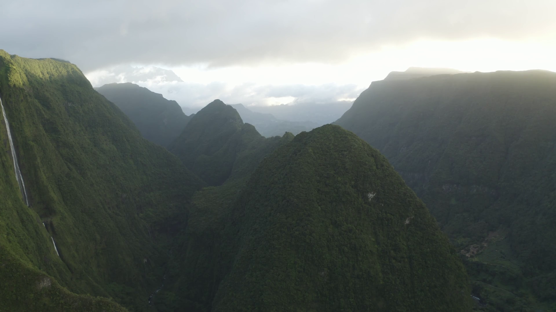 Aerial view of Cascata do Poco do Bacalhau, a beautiful waterfall in Faja Grande, Azores islands