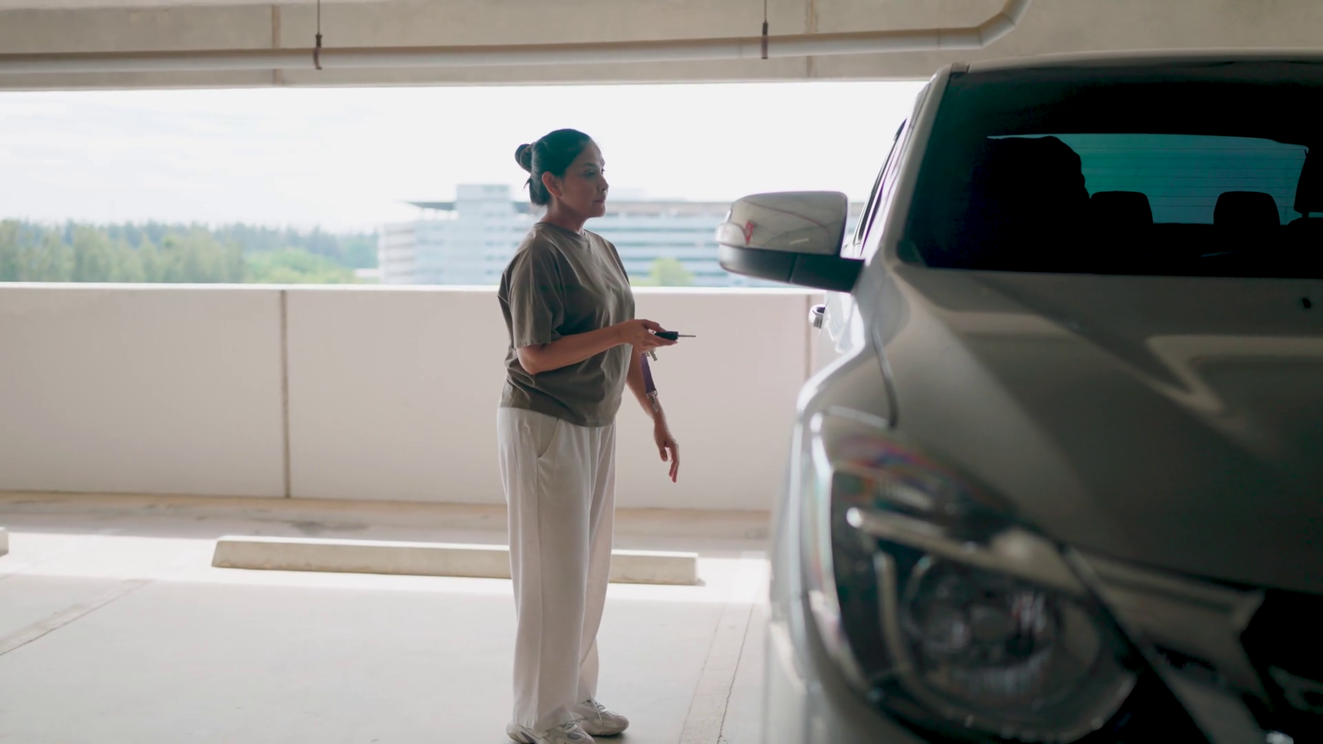 Parking Lot Departure Woman Checks Phone Stock Footage SBV-351703448 ...