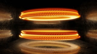 Two hovering neon rings with twisted, braided textures illuminated by vibrant golden tones