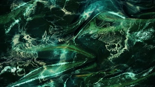 Fluid, oceanic expanse in teal and green tones. The marbled textures and foamy patterns evoke a sense of moving water