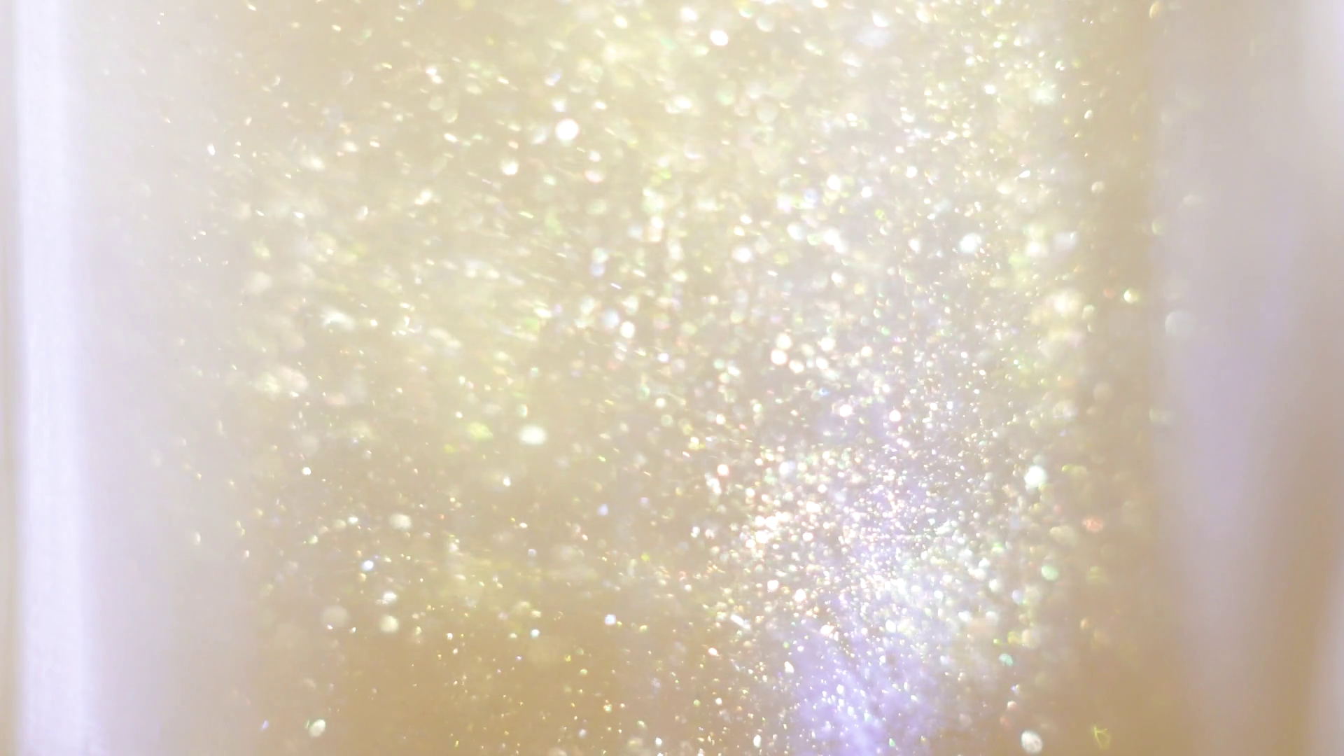 Closeup Of Glitter Floating In Vodka Stock Footage SBV333364427