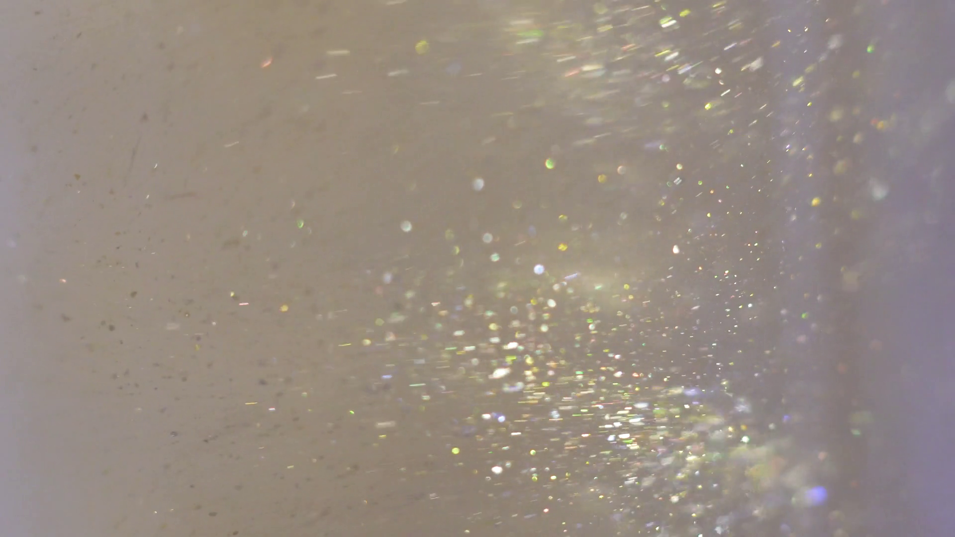 Closeup Of Glitter Floating In Vodka Stock Footage SBV333364676