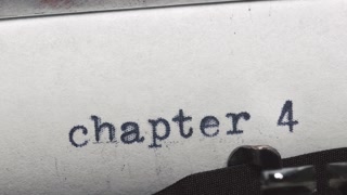 Chapter 4. Typed on an old vintage typewriter. Close-up