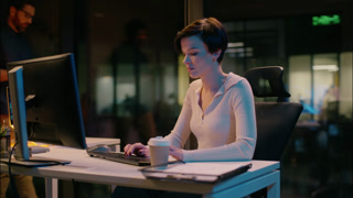 Business man going in night office woman employee argue discuss corporate project online work computer problem businessman businesswoman