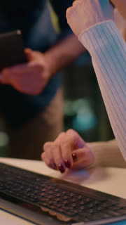 Business man woman working computer together in night evening office businessman businesswoman co-workers cooperation teamwork consulting