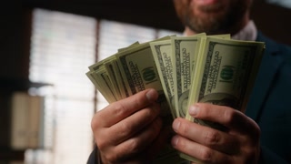 Close up male hands holding dollars Caucasian office businessman counting cash at workplace closeup business man hold money financial