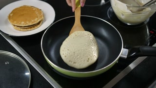 https://dm0qx8t0i9gc9.cloudfront.net/thumbnails/video/Stw4Y28Bippgedql/videoblocks-top-view-close-up-view-of-female-hand-flipping-pancake-on-frying-pan-stack-of-cooked-pancakes-on-the-plate-near-the-pan-homemade-delicious-breakfast_bhedevnxjf_thumbnail-180_03.jpg?utm_source=chatgpt.com